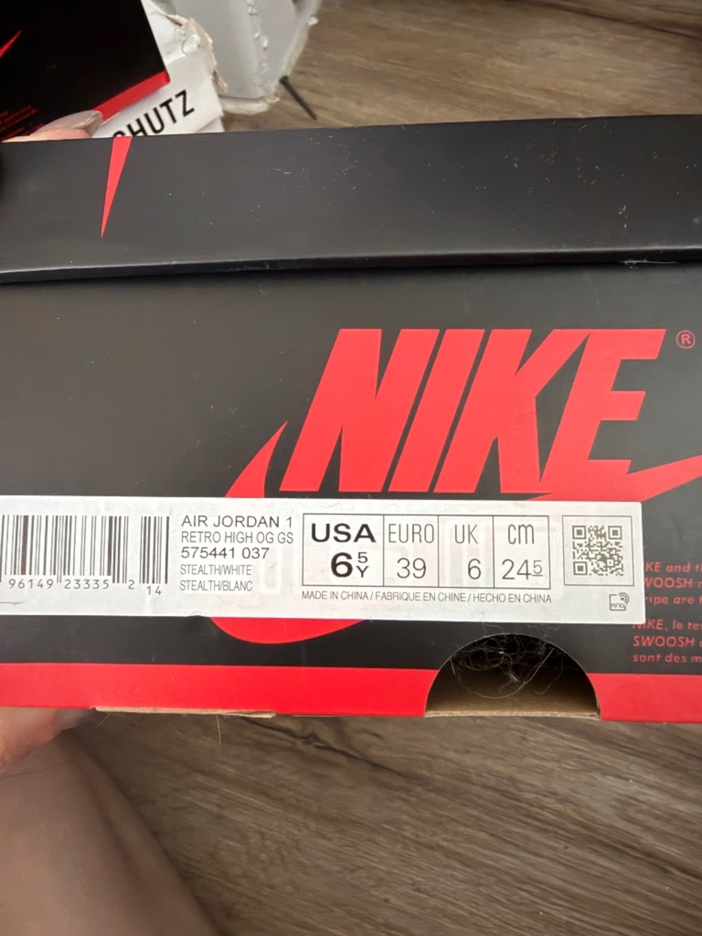 Air Jordan 1 Retro High OG “Stealth” (GS) sneakers.